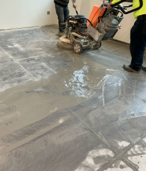 How to moderately prep concrete floor without deep scratches